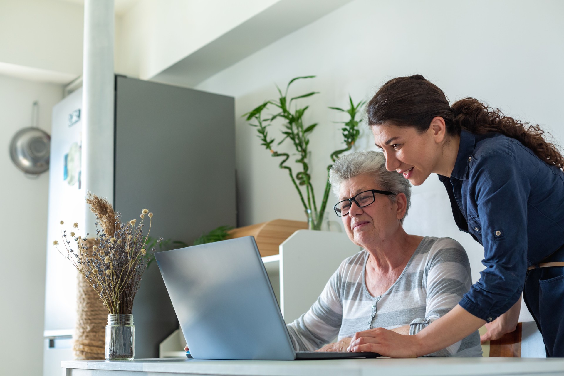 Senior women using laptop